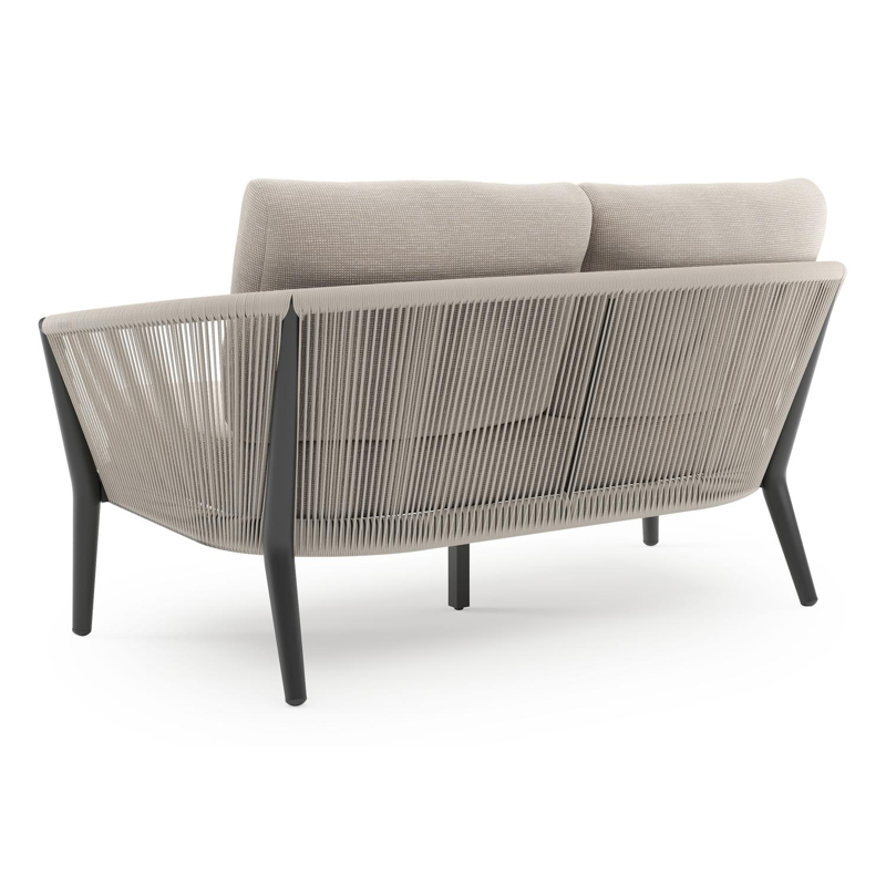 Orso loungebank in zwart aluminium en beige verticaal geweven ronde rope met Slow Farafra all weather sunbrella® luxe kussen