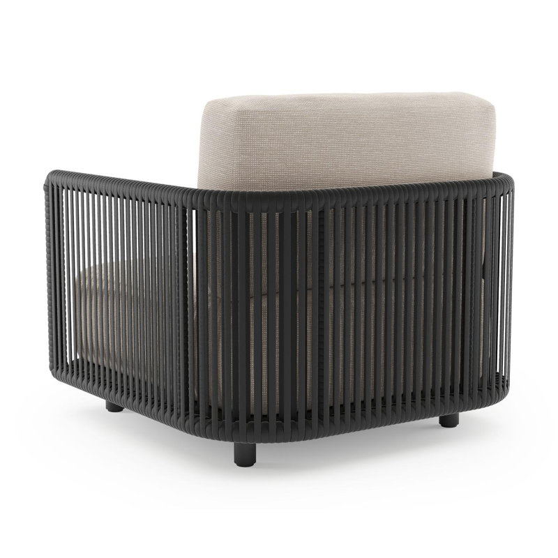 Fauteuil de jardin Organo en aluminium noir et corde luxe plate tissée verticalement noir et coussin en all weather Sunbrella® luxe slow farafra