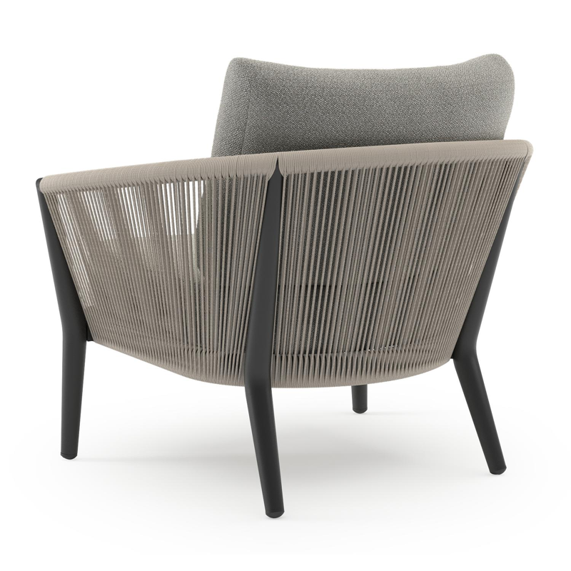 Orso loungestoel in zwart aluminium en beige verticaal geweven ronde rope met Savane Tunder all weather sunbrella® luxe kussen