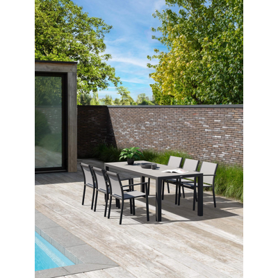 Varese tuinset in zwart aluminium en grijs volkeramiek tafelblad met 6 stapelbare Bareto tuinstoelen