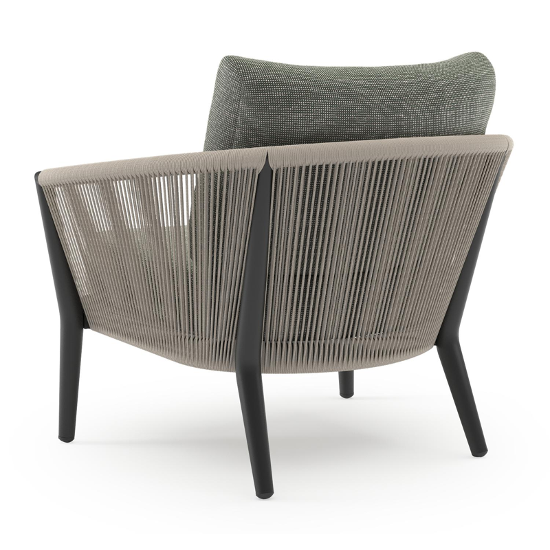 Orso loungestoel in zwart aluminium en beige verticaal geweven ronde rope met Slow Fern all weather sunbrella® luxe kussen