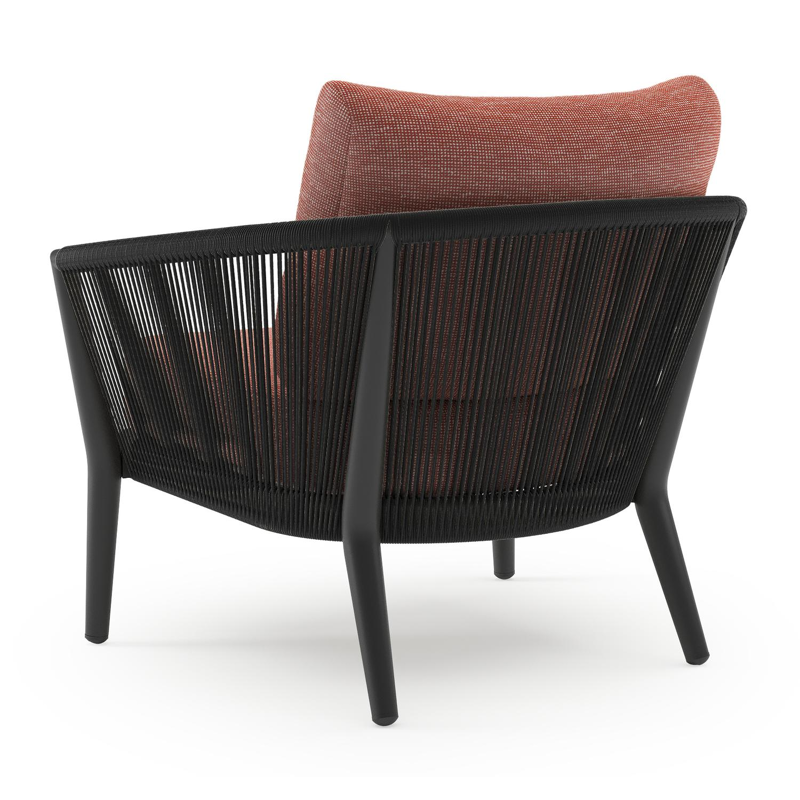 Fauteuil de jardin Orso en aluminium noir en corde ronde tissée verticalement noir et coussins en all weather sunbrella® luxe Slow Alezan