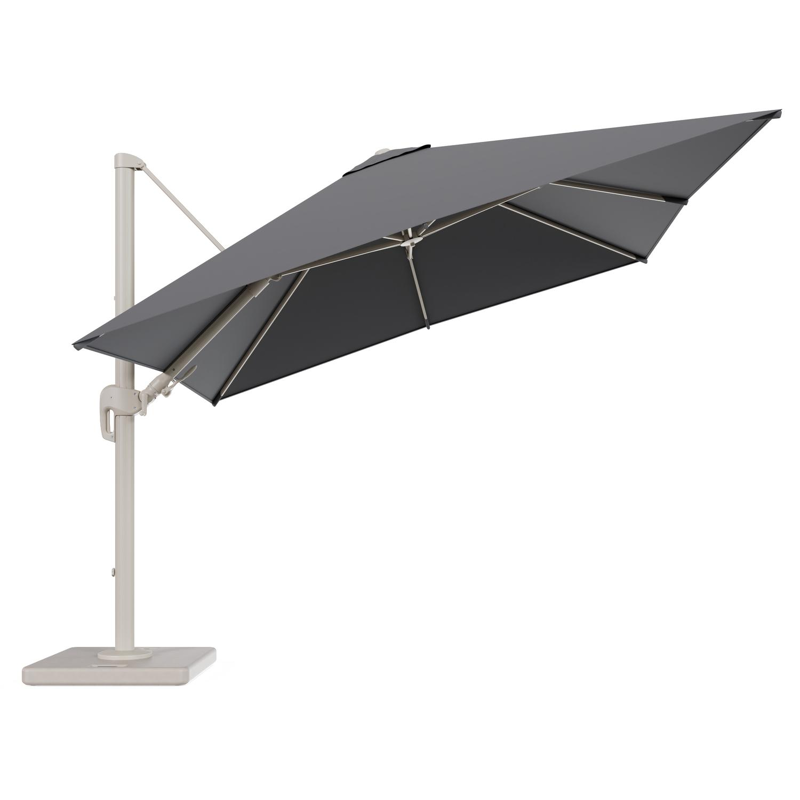 Rufina zweefparasol tiltfunctie in beige aluminium en parasoldoek in All Weather Sunbrella® Luxe Natte Charcoal Chine - L1 300 x L2 300 cm met parasolvoet Lapido 120 kg