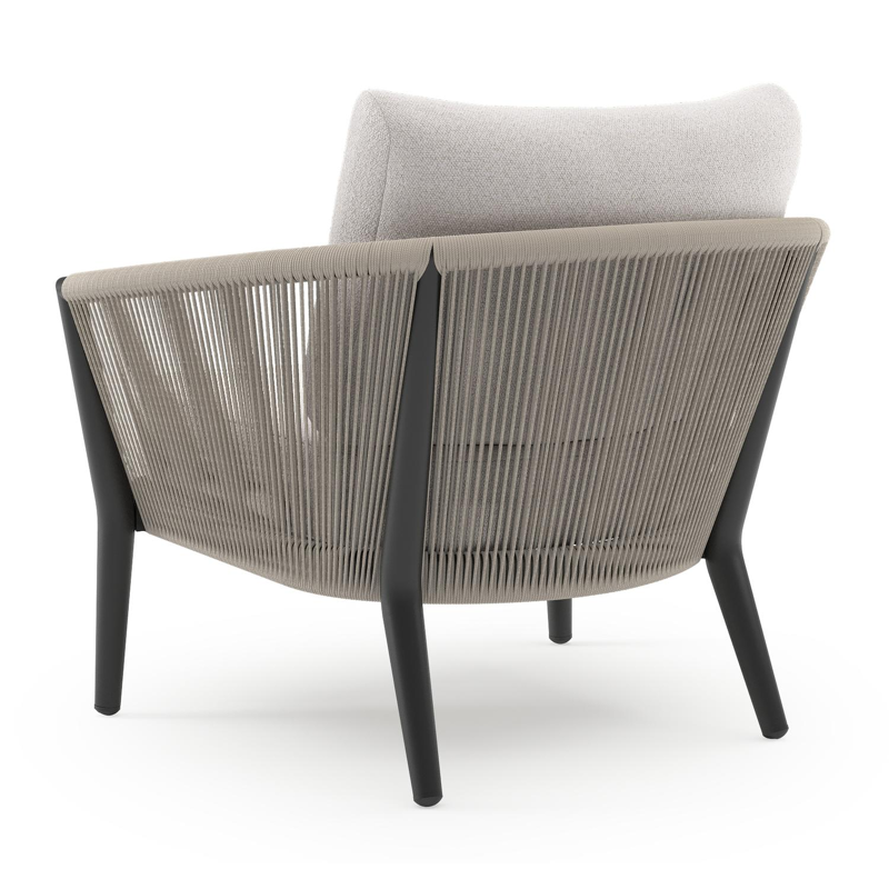 Orso loungestoel in zwart aluminium en beige verticaal geweven ronde rope met Ego Eggshell all weather solica kussen