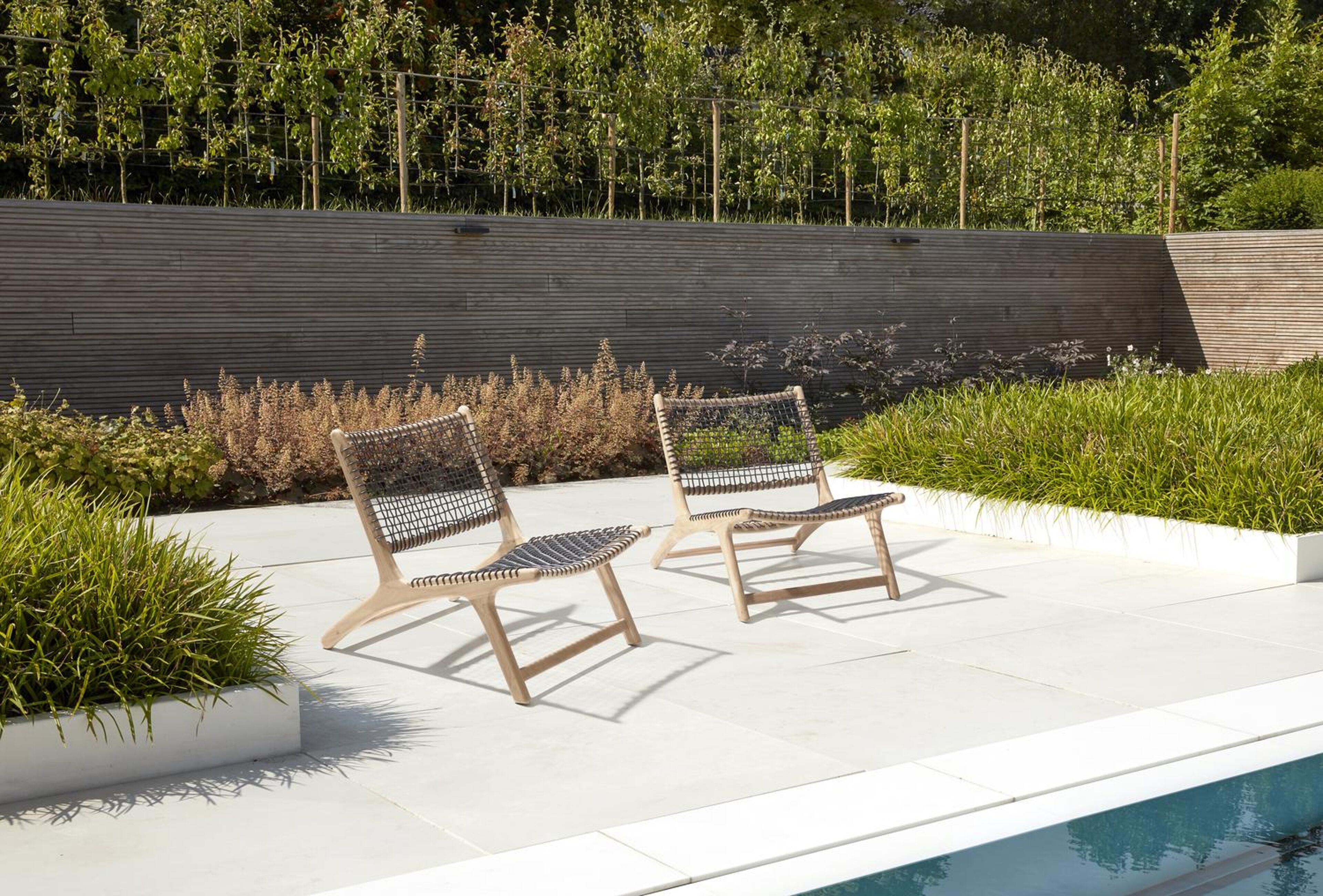 Cosito loungezetel 1-zit in teak en zwart wicker