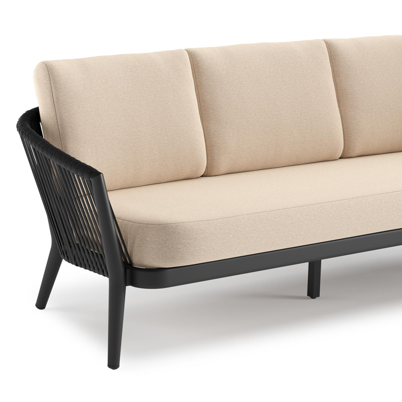 Orso loungeset in zwart aluminium en zwart verticaal geweven ronde rope met Heritage Papyrus all weather sunbrella® luxe kussen