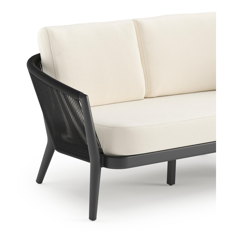 Orso loungebank in zwart aluminium en zwart verticaal geweven ronde rope met Natte White all weather sunbrella® luxe kussen
