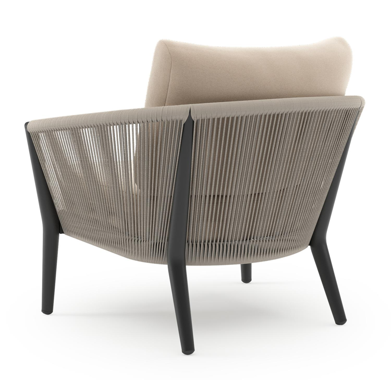 Orso loungestoel in zwart aluminium en beige verticaal geweven ronde rope met Natte Linen Chalk all weather sunbrella® luxe kussen