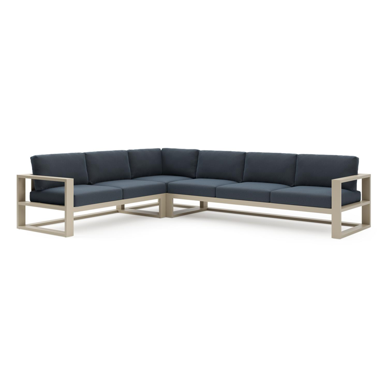 Verato loungehoek in beige aluminium met heritage indigo all weather sunbrella® luxe kussen
