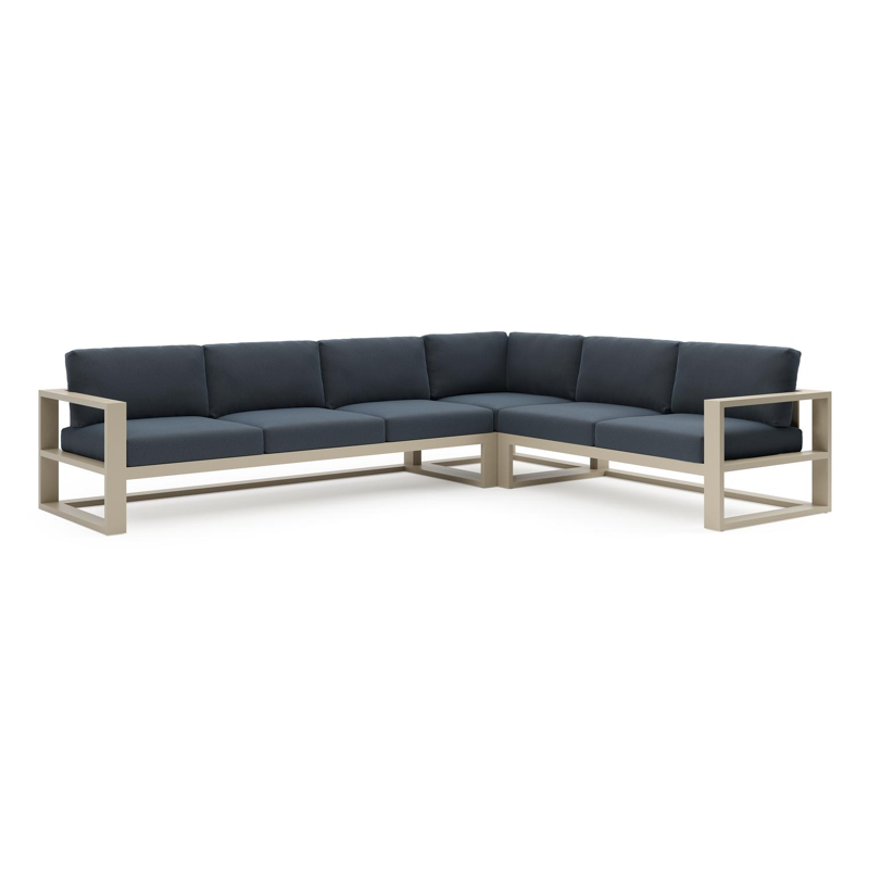 Verato loungehoek in beige aluminium met heritage indigo all weather sunbrella® luxe kussen