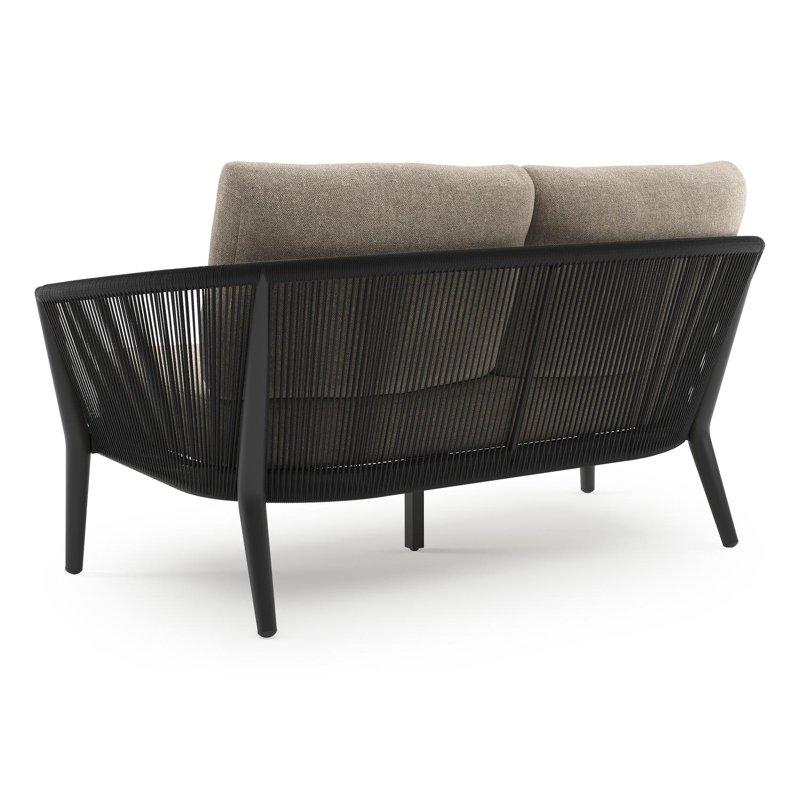 Orso loungebank in zwart aluminium en zwart verticaal geweven ronde rope met Chartres Pewter all weather sunbrella® luxe kussen